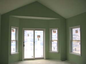 Master Bedroom with Vaulted Ceiling and French Doors.
